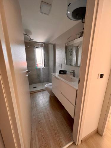 a bathroom with a sink and a toilet at Residence Borghi in Scalea