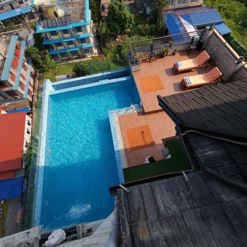 an overhead view of a swimming pool on a building at Hotel Mala Pokhara in Pokhara