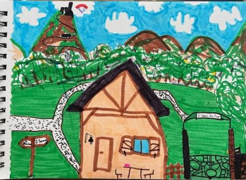 a drawing of a house in a green field at Chalets "Ô Cœur des Puys" in Ceyssat