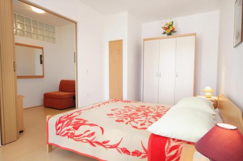 Posteľ alebo postele v izbe v ubytovaní Apartment Rabac 2340c
