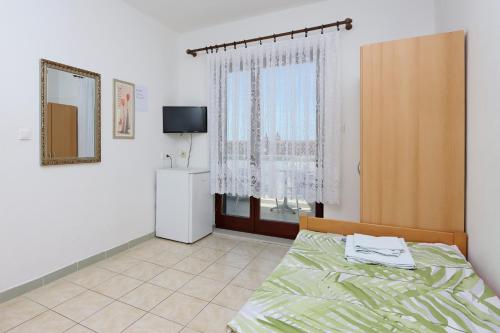 Postel nebo postele na pokoji v ubytování Twin Room Selce 2362a