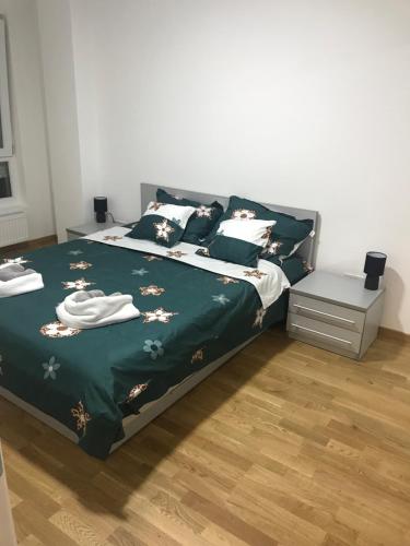 Ένα ή περισσότερα κρεβάτια σε δωμάτιο στο Apartman Tara Jagodina, ima free parking u garazi