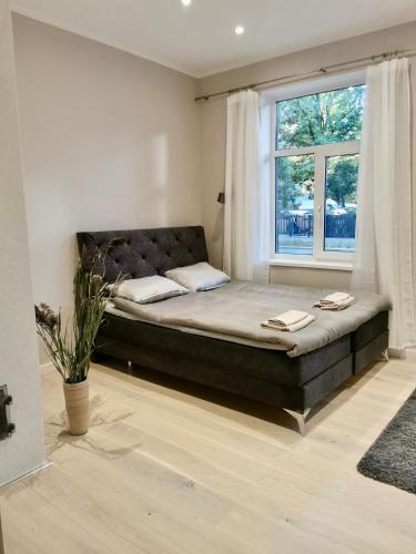 Postel nebo postele na pokoji v ubytování Scandinavian apartment, Free parking