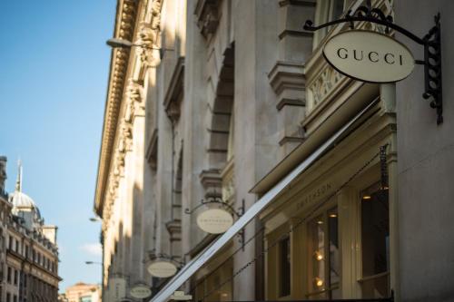 a store sign on the side of a building at Apex City Of London Hotel in London