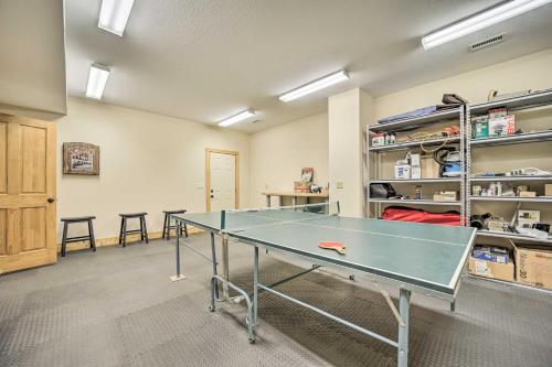 a room with a ping pong table in it at Secluded Sapphire Chalet with Game Room and Decks in Sapphire