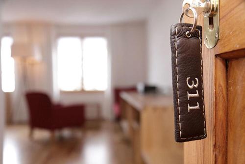 a door with a lock in a room at Krone Hittisau - Hotel & Restaurant im Bregenzerwald in Hittisau