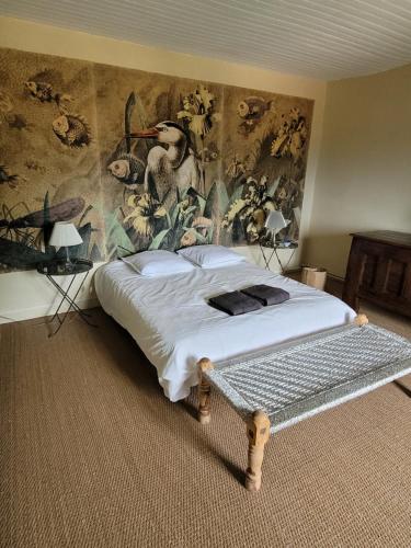 Postel nebo postele na pokoji v ubytování Maison familiale de charme