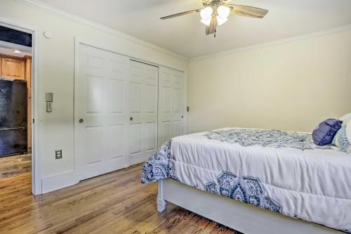 a bedroom with a bed and a ceiling fan at Serene Hopatcong Cottage with 50-Foot Dock! in Hopatcong