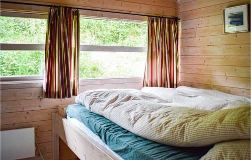 Cama o camas de una habitación en Beautiful Home In Vossestrand With Wifi