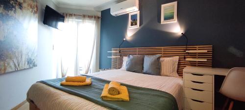 Giường trong phòng chung tại In My Apartement Baleal