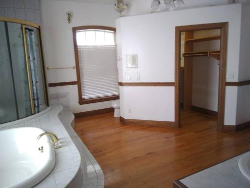 a bathroom with a sink and a toilet at Villa Melbourne inter-coastal 2 floors 7br, heated pool in Melbourne