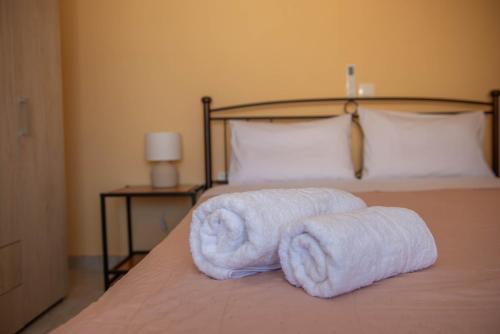 Ένα ή περισσότερα κρεβάτια σε δωμάτιο στο Villa Kondraki