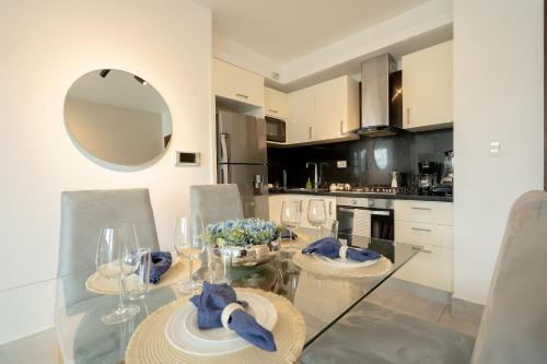 Η κουζίνα ή μικρή κουζίνα στο Soha suites I