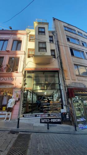 a store on a street in front of a building at Galata Life Istanbul in Istanbul