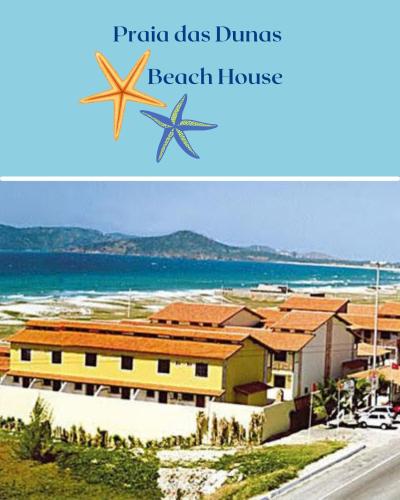 a picture of a beach house with the words prairie class dume beach house at Conforto e lazer com vista para o mar - Praia das Dunas Beach House in Cabo Frio