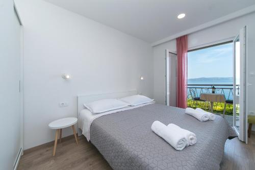 Apartments by the sea Podgora, Makarska - 2614