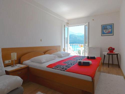 Säng eller sängar i ett rum på Apartments and rooms by the sea Slano, Dubrovnik - 2682