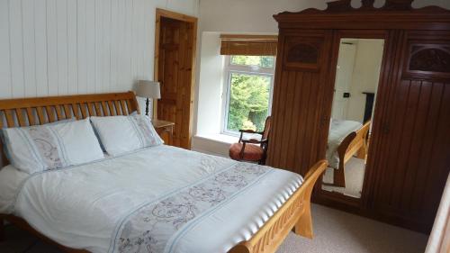 Voodi või voodid majutusasutuse Riverside Glanworth toas