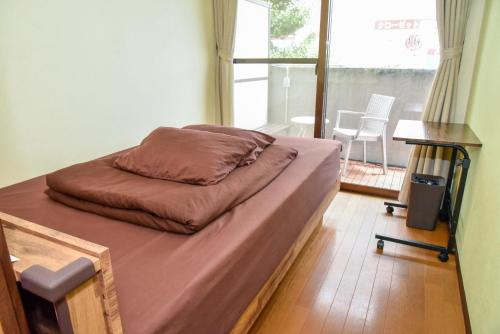 Postel nebo postele na pokoji v ubytování Green Guesthouse