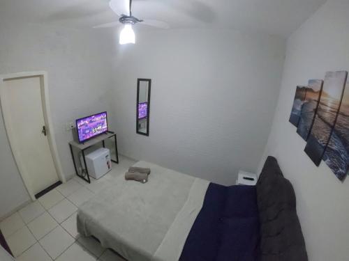 Een bed of bedden in een kamer bij Soul do Mar Hostel