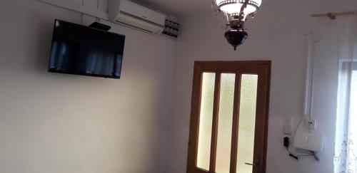 Μια τηλεόραση ή/και κέντρο ψυχαγωγίας στο Apartment Vis 2436a