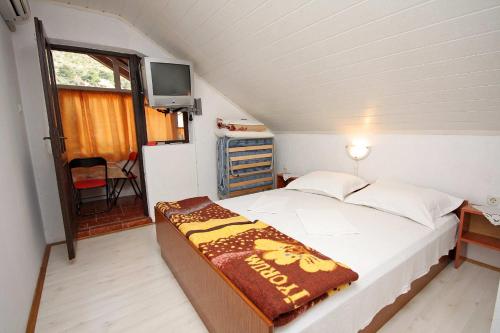 Postel nebo postele na pokoji v ubytování Apartments and rooms with WiFi Podaca, Makarska - 2613