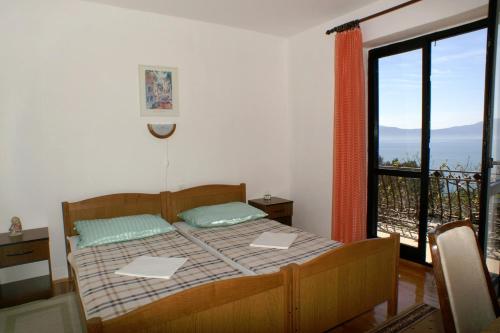 Postel nebo postele na pokoji v ubytování Apartments by the sea Podaca, Makarska - 2590