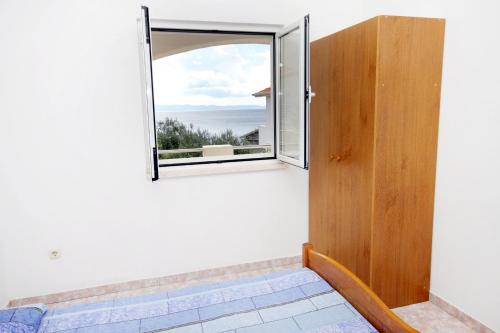 Ένα ή περισσότερα κρεβάτια σε δωμάτιο στο Apartment Jedra 2583b