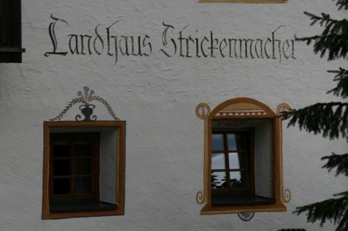 two mirrors on the side of a building at Landhaus Strickenmacher in Sillian