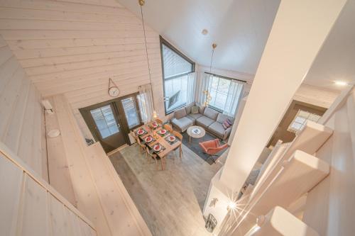 an overhead view of a living room with a couch at Levillas Sointuilevi 1A72, 2 ski pass included in Levi