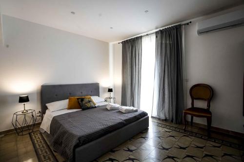 Giường trong phòng chung tại Appartamento Catania centro