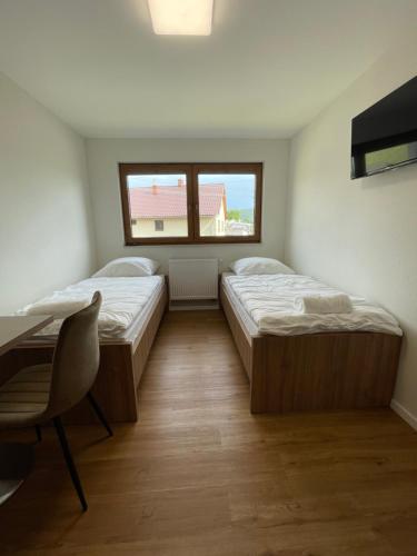 Postel nebo postele na pokoji v ubytování Apartmotel ANROE