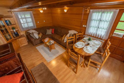 an overhead view of a living room with a couch and a table at Chalet Ajda in Bohinj