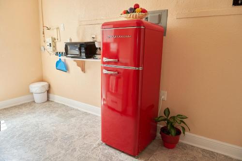 a red refrigerator in a room with a kitchen at Little Havana Executive 11 in Miami