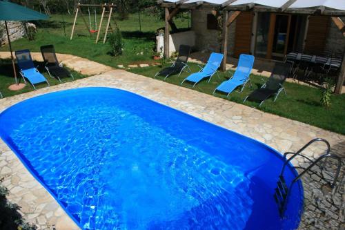 The swimming pool at or close to Family friendly house with a swimming pool Mrkoci, Central Istria - Sredisnja Istra - 13003