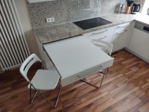 Η κουζίνα ή μικρή κουζίνα στο Ferienhaus in Seenähe