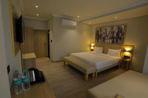 Hotel City Express Udaipur - My Downtown Hotelsにあるベッド