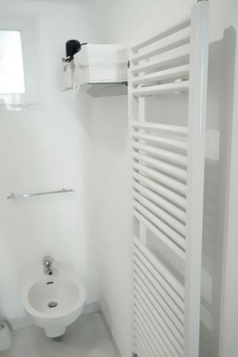 Ванная комната в Mombello Loft