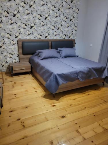 Ένα ή περισσότερα κρεβάτια σε δωμάτιο στο guest house TSVARA