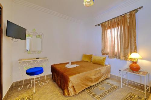 Μια τηλεόραση ή/και κέντρο ψυχαγωγίας στο Riad Hôtel Essaouira