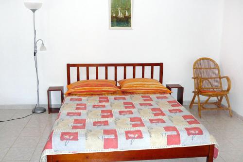 Ένα ή περισσότερα κρεβάτια σε δωμάτιο στο Apartment Postira 2919a