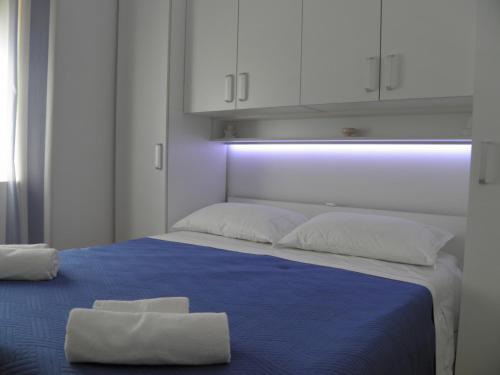 Ένα ή περισσότερα κρεβάτια σε δωμάτιο στο Apartment Mirca 2838b