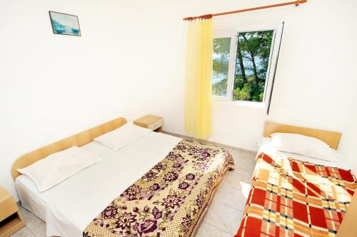 Posteľ alebo postele v izbe v ubytovaní Seaside secluded apartments Cove Tvrdni Dolac, Hvar - 2997