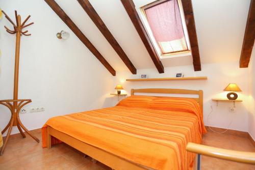 Postel nebo postele na pokoji v ubytování Apartment Okrug Donji 2977b