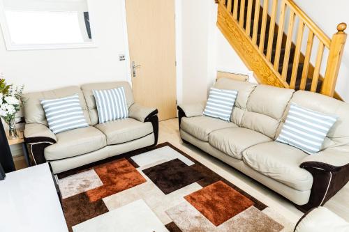 Posezení v ubytování Resource Homes