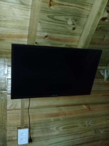 TV a/nebo společenská místnost v ubytování Chalés Snow