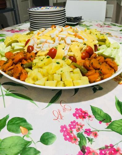 a plate of food on top of a table at Riad Nasma Souihla in Marrakech
