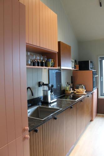 a kitchen with a sink and a counter top at Viste Funäsdalen in Funäsdalen
