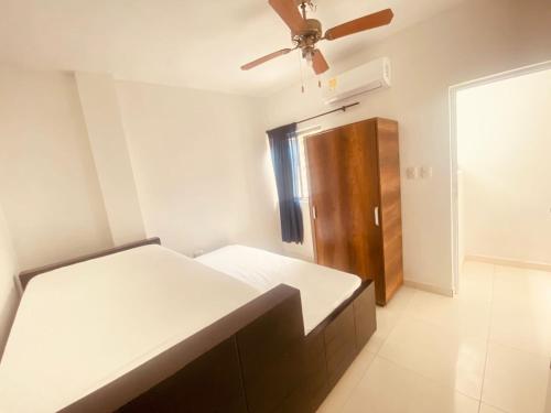 Postel nebo postele na pokoji v ubytování Mayo apartamentos