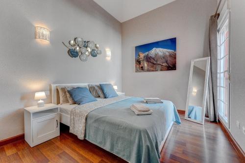 Postel nebo postele na pokoji v ubytování VILLA PALMA CANARIAS